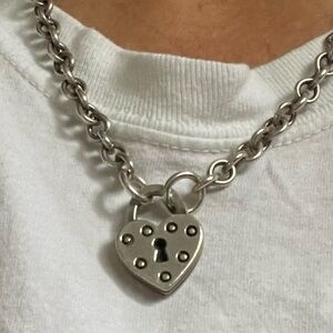 Chunky solid silver chain with locked heart pendant